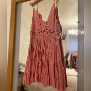 Free people intimately pink dress it has some crochet details  brand new